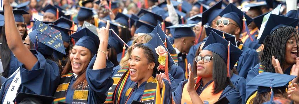 Group of students excited at graduation